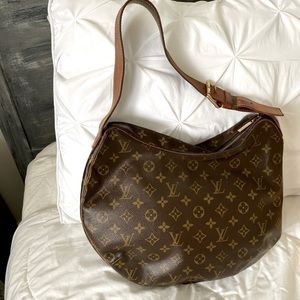 LV Croissant bag. Price reflects wear shown in pictures.
